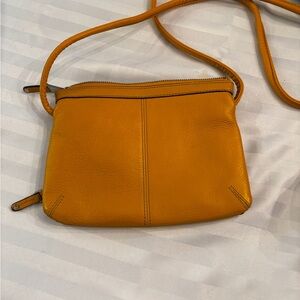 Elegant Tignanello Mustard Crossbody Bag